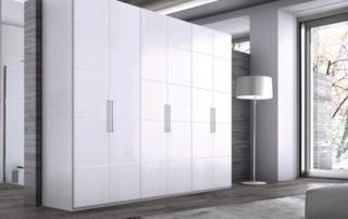A bathroom with a shower and a toilet.
